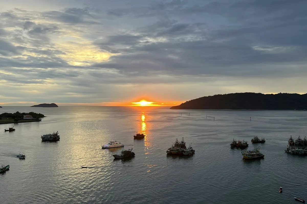 Fishing boats at sunset off Kota Kinabalu, the Sabah capital with a small but busy tattoo scene